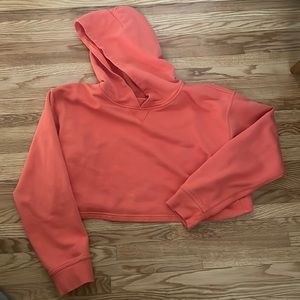 Lululemon crop hoodie in solar orange